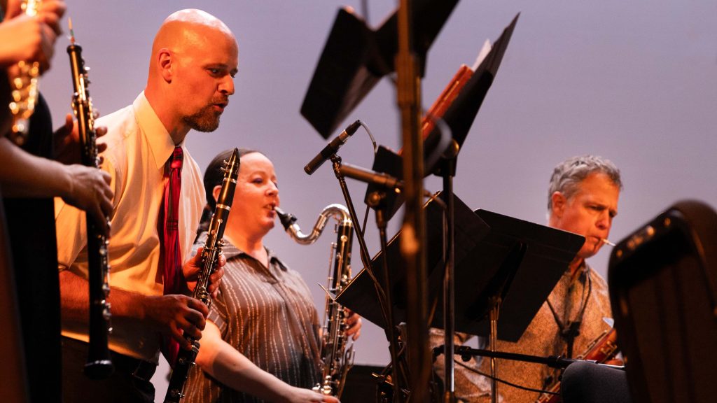 Bill Kalinkos (left) performing as a member of Alarm Will Sound